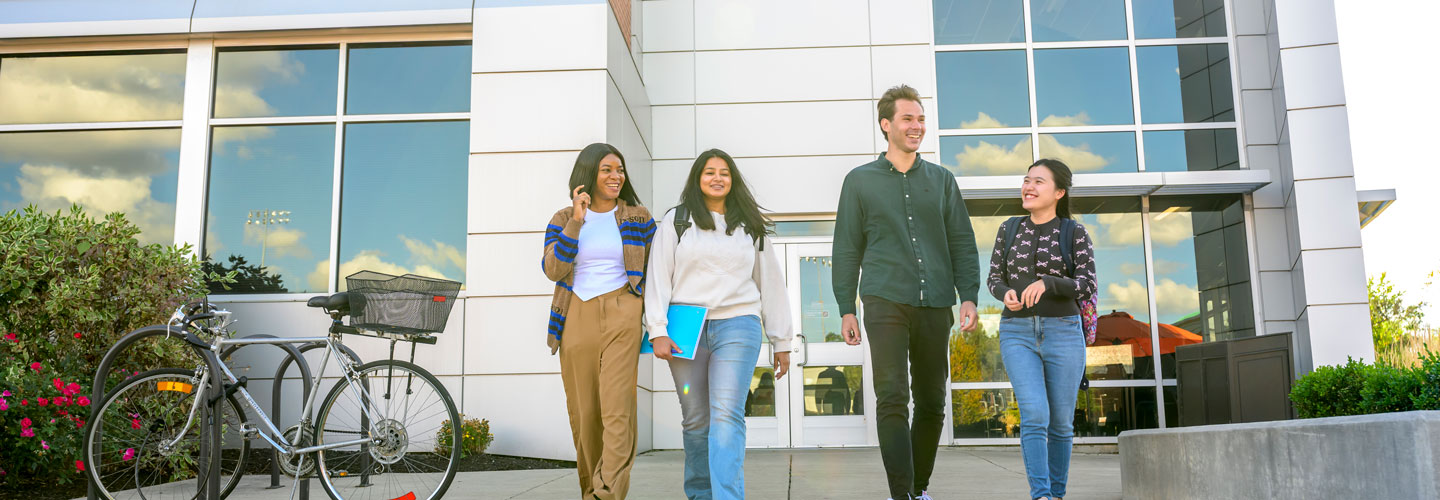 Students walking out of the Cunningham Business Center